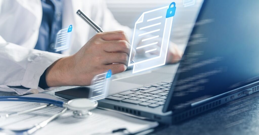 Médico usando notebook para organizar documentos e finanças durante a residência médica